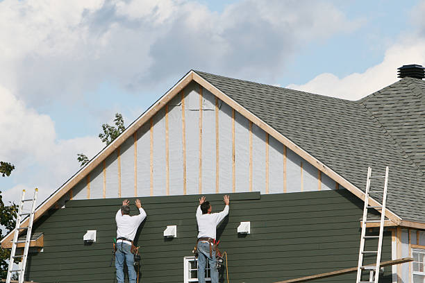 Professional Siding technician working in Frenchville, PA